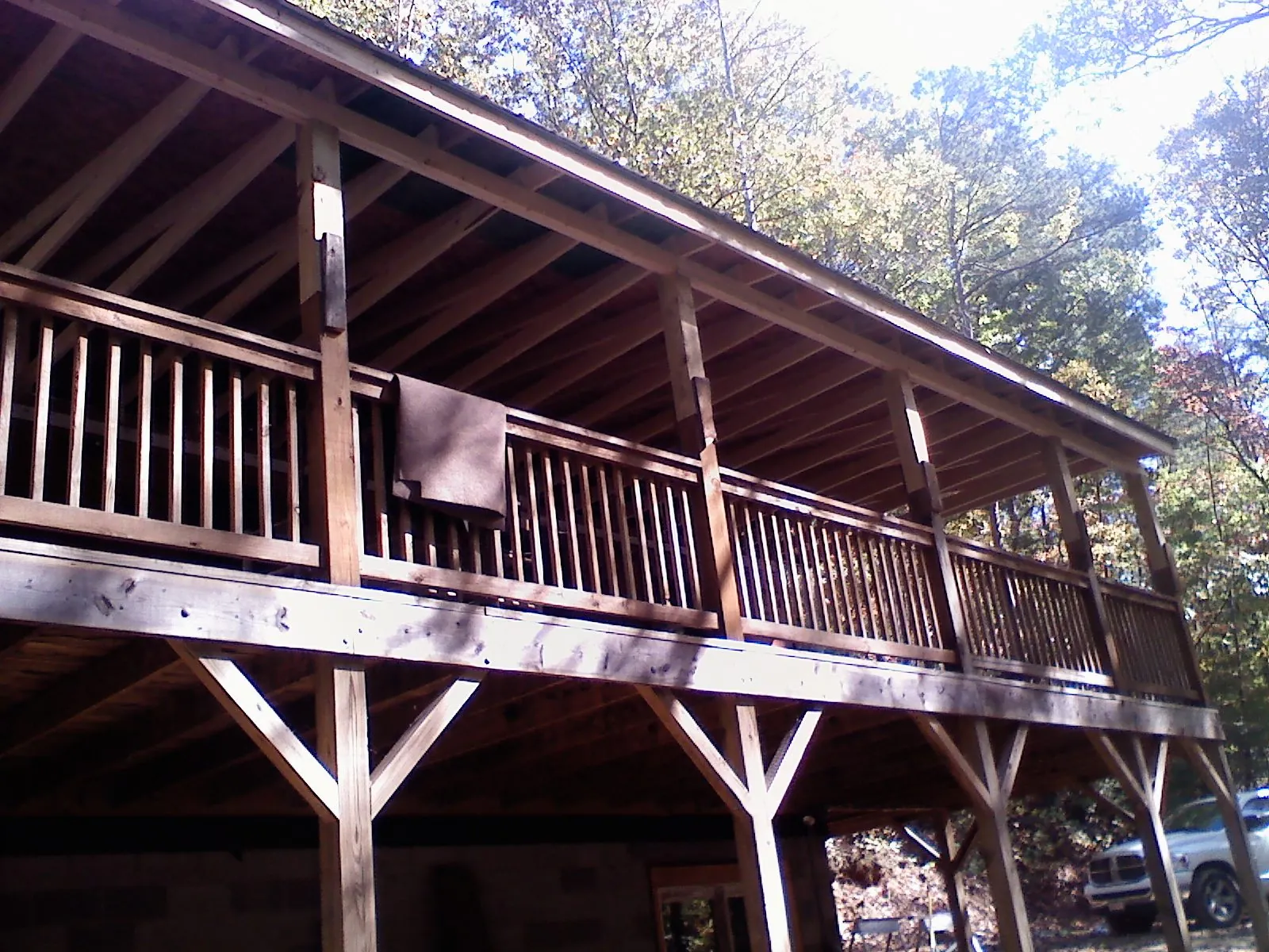 Timber framing under a new elevated porch and deck — Roof Leak Repair in Villas by Roofing Brothers